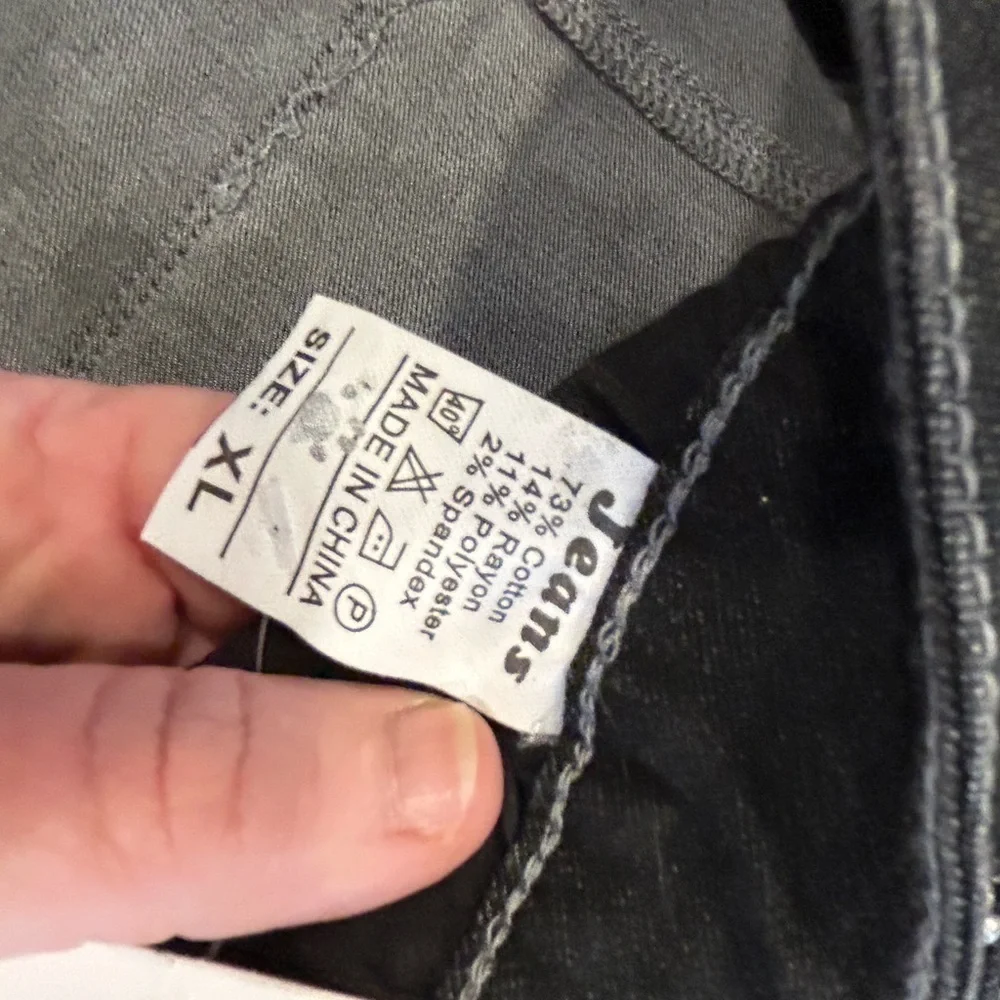 Jeans distressed denim shorts. NWT XL. Folded cuff. Black denim.